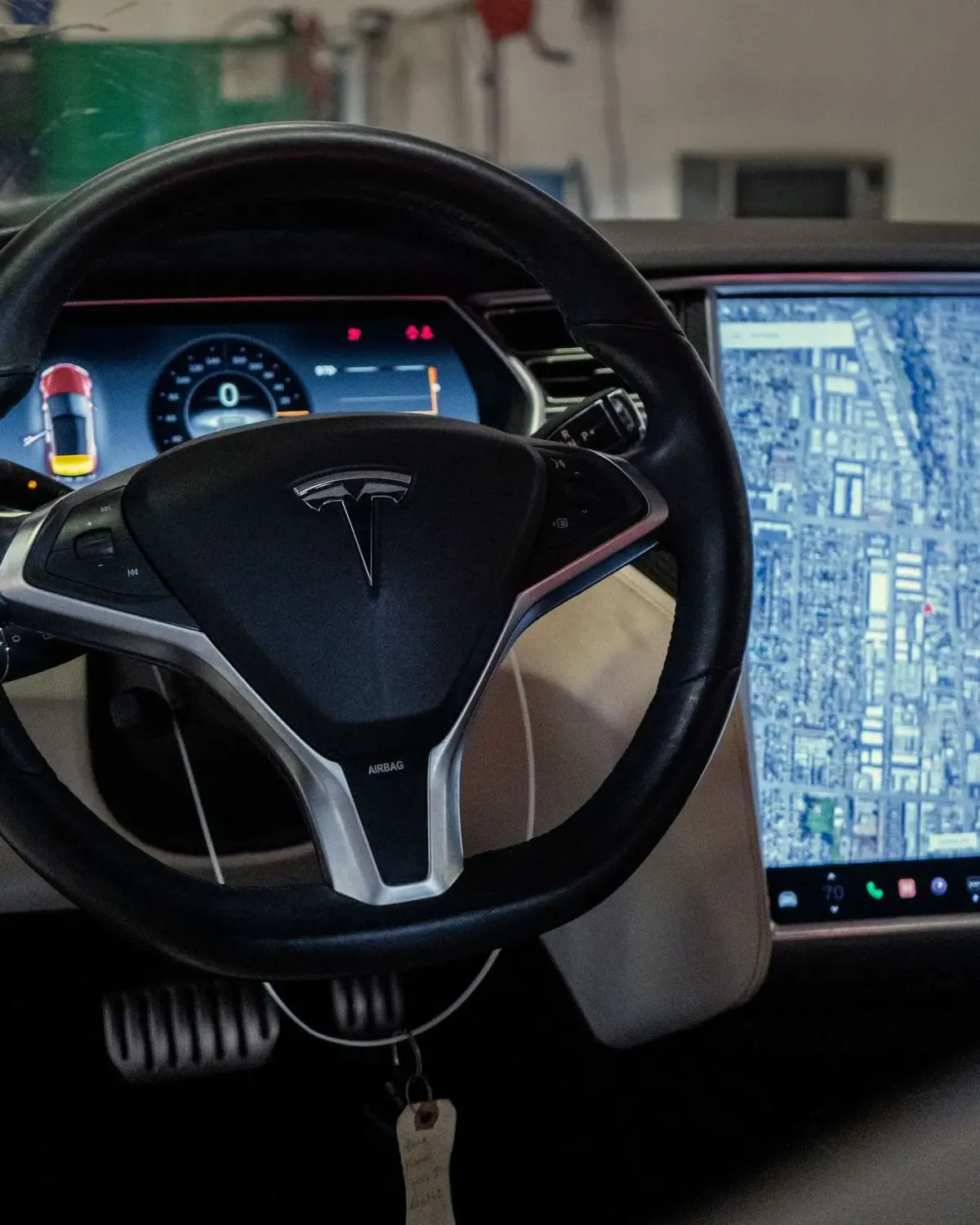 Tesla Model S dashboard and touchscreen during a diagnostic check